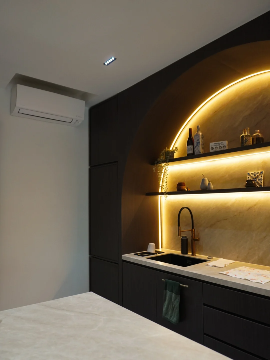 Illuminated shelves and curved display cabinetry